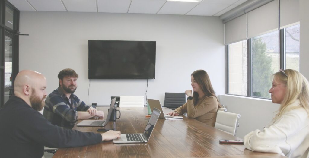 A meeting in the DSM conference room